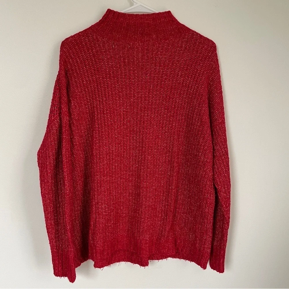 Maurice’s red sweater